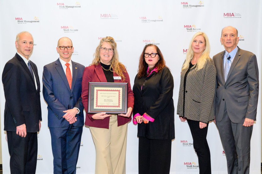 In honor of the late Bridget McGuiness, who led training workshops for MIIA, a new Safety Leadership Award is presented to Yarmouth Assistant Public Works Director Roby Whitehouse during MIIA’s Annual Business Meeting on Jan. 20. Pictured, left to right, are MIIA Chair Paul Cohen; MIIA President and MMA Executive Director Adam Chapdelaine; Whitehouse; Margot Abels, McGuiness’s wife; Jilayne Mitchell of Cabot Risk Strategies; and MIIA Executive Vice President Stan Corcoran.